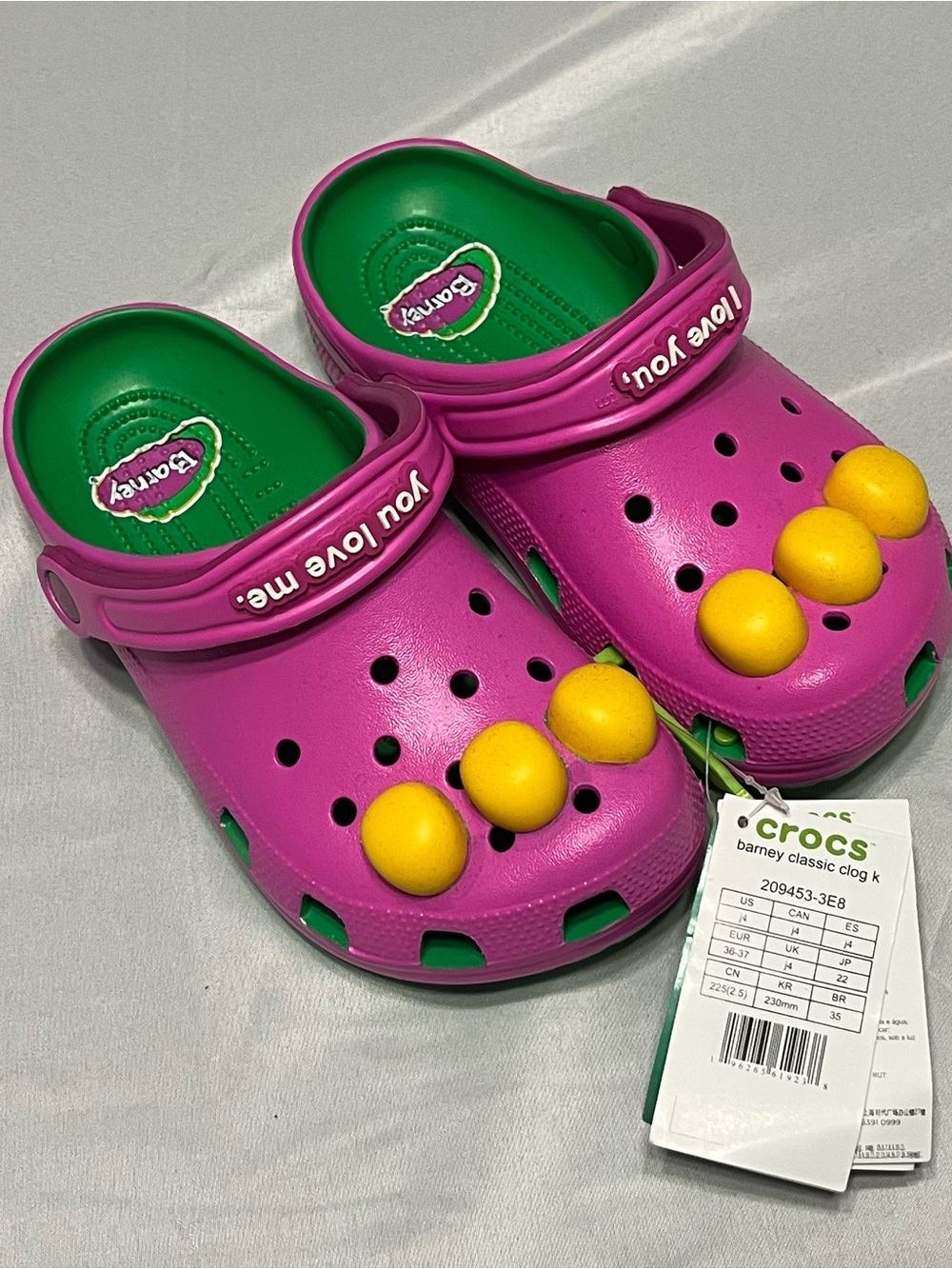 CROCS Barney Classic Clog in Purple with Yellow and Green Accents